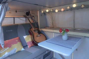 guitar in Volkswagen campervan