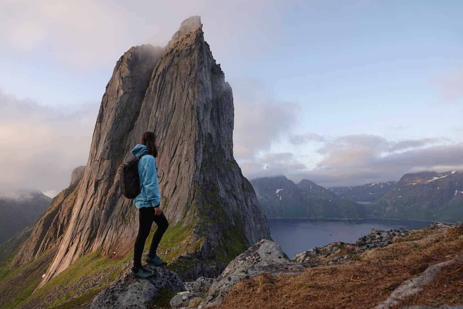 woman on hike to mountain Segla in Norway