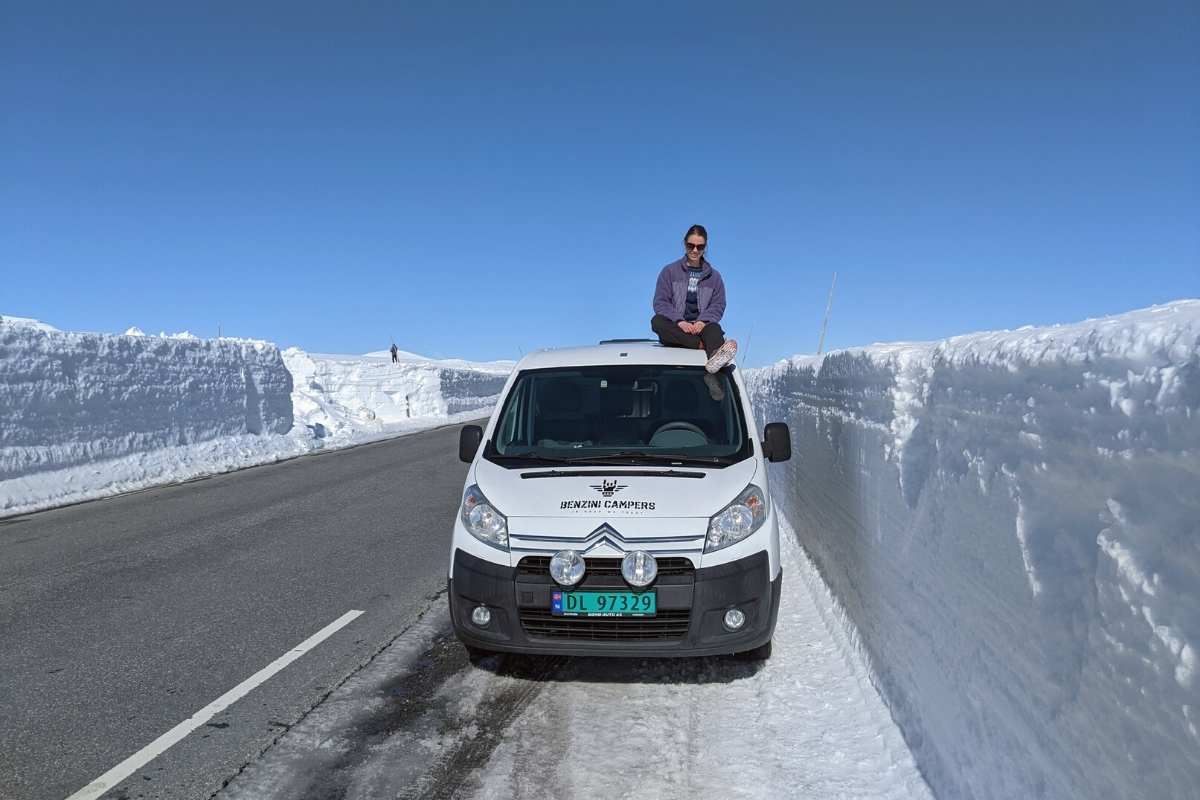 campervan between snow walls